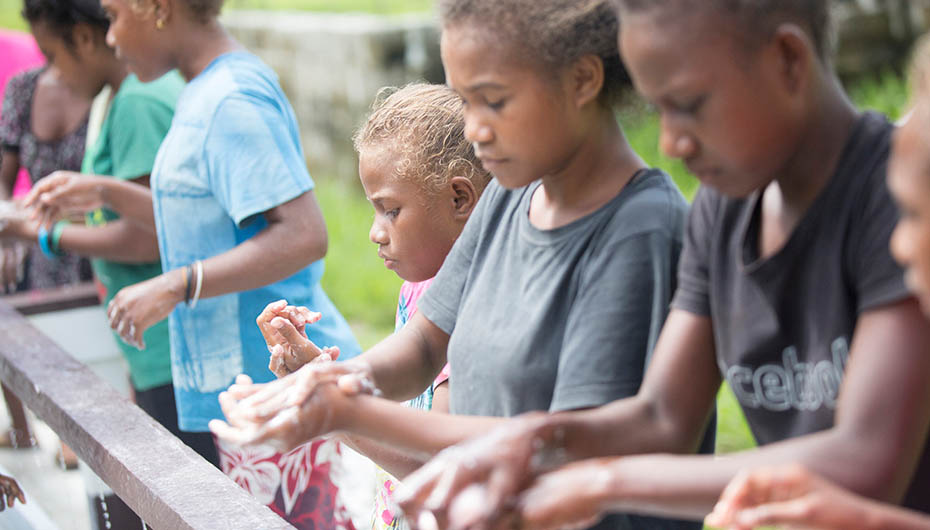 Girls from the Solomon Islands learn handwashing at school