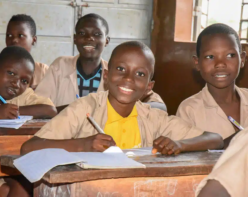 Boy learning at primary school in Ouémé Department, Benin