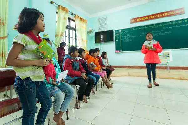 Vai and her classmates learning about disasters at school