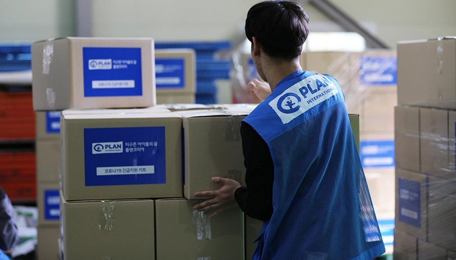 Plan staff prepare the Corona Emergency Kits ready for distribution