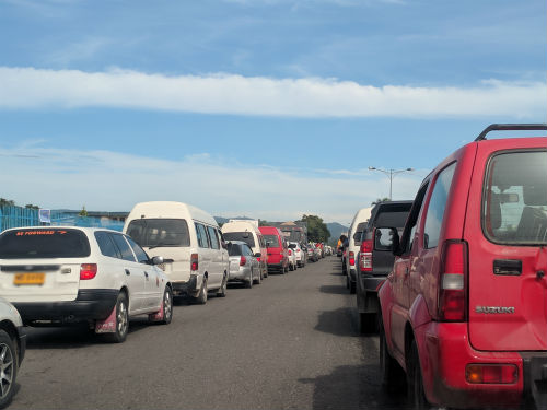 Traffic full of vans and utes in the Solomon Islands