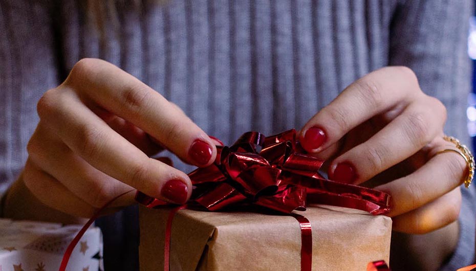 woman-wrapping-gift