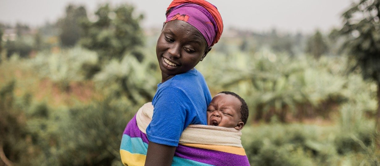 Jeanette, 20, with her youngest child, 6-month-old Fistan