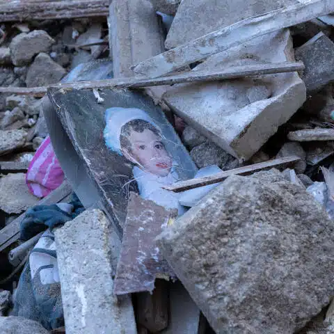 A photo of a girl in the rubble of the Turkey Syrian earthquake