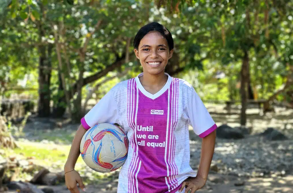 Maria, 14, says that playing football makes her feel happy