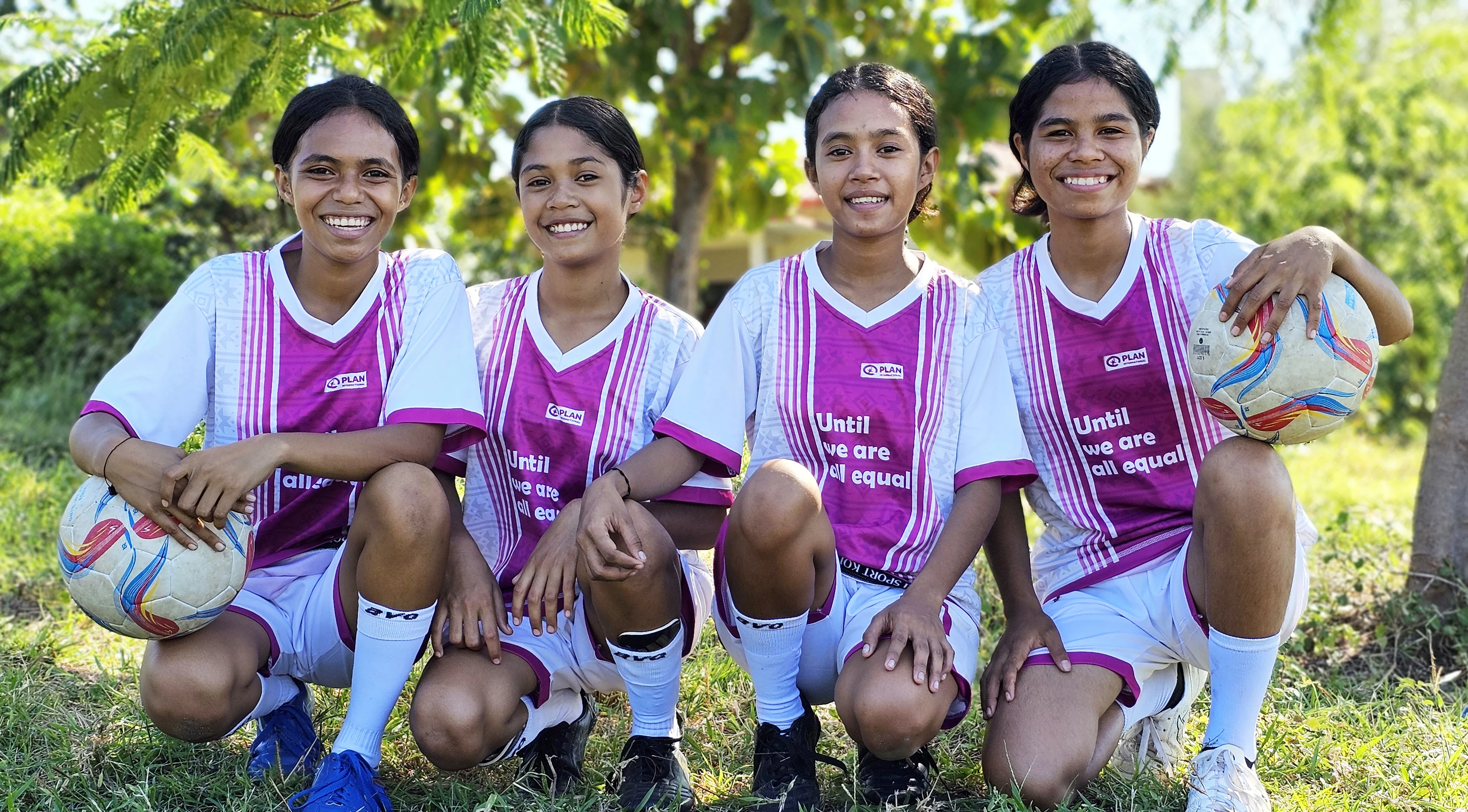 Maria (left) with some of her teammates at the football tournament