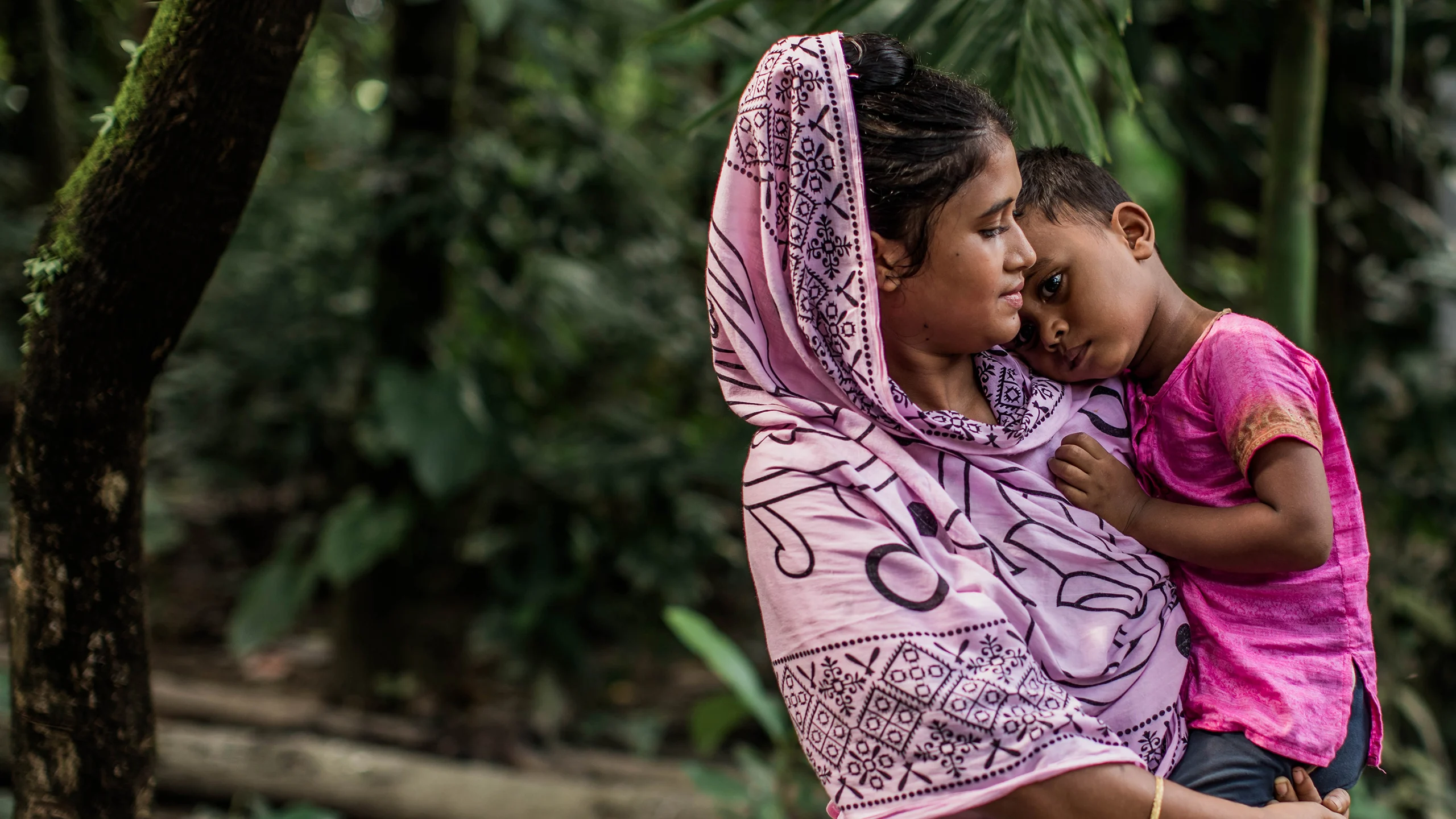 Aysha, 18, with her four-year-old son Sakib  