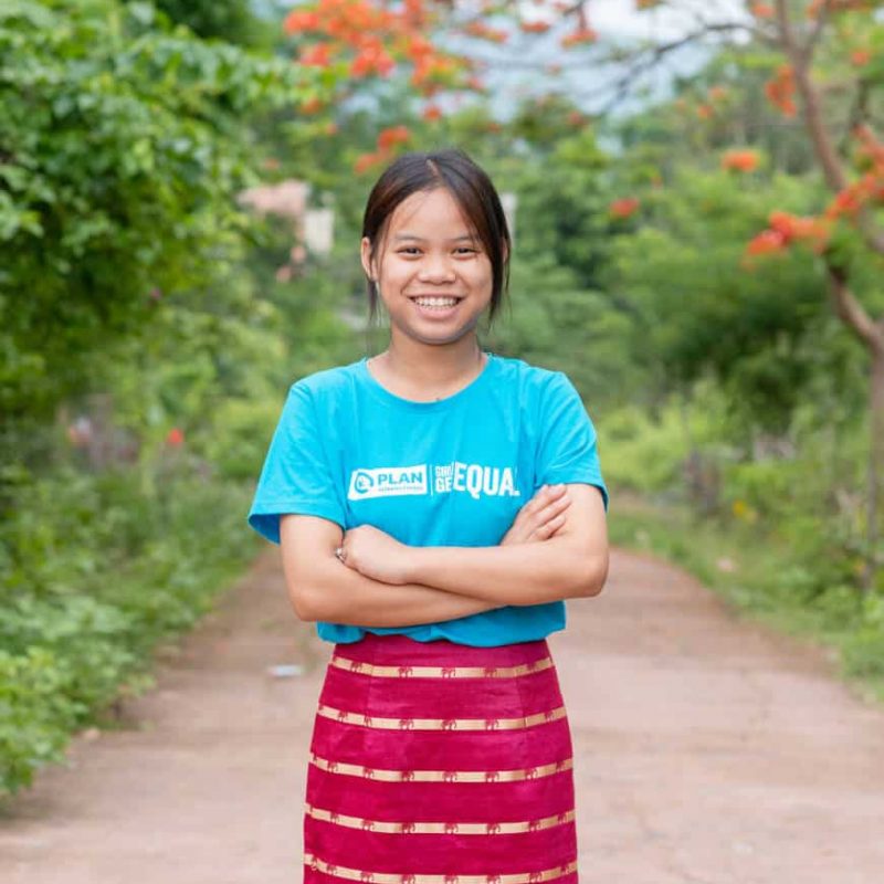 A young girl smiling