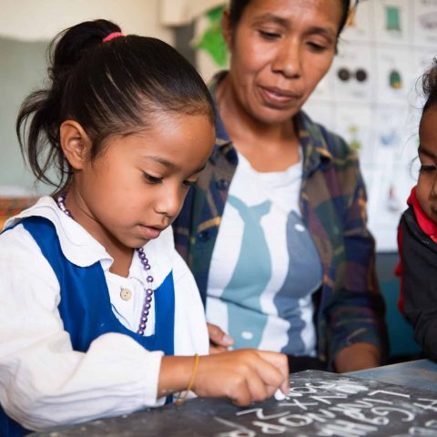 Elizabet is a mother of five (three girls and two boys) living in the remote and mountainous region of Ainaro in central Timor-Leste. Her children, including six-year-old Jonalia, are involved in a Plan-supported early childhood development (ECD) group at the local school - just one of the activities Plan International runs as part of the Parenting Nutrition Hygiene Education for Parents in Timor-Leste project, which they have been implementing since 2018. 

The ECD programme gives children access to play and learning opportunities, and emphasises the role of parents in their child's development. Elizabet has been a member of the parenting group since 2019, and although her husband does not attend as often as she does, they both attend the project-supported parenting sessions, which focus on nutrition and positive parenting.