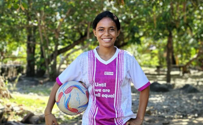 Maria, 14, says that playing football makes her feel happy